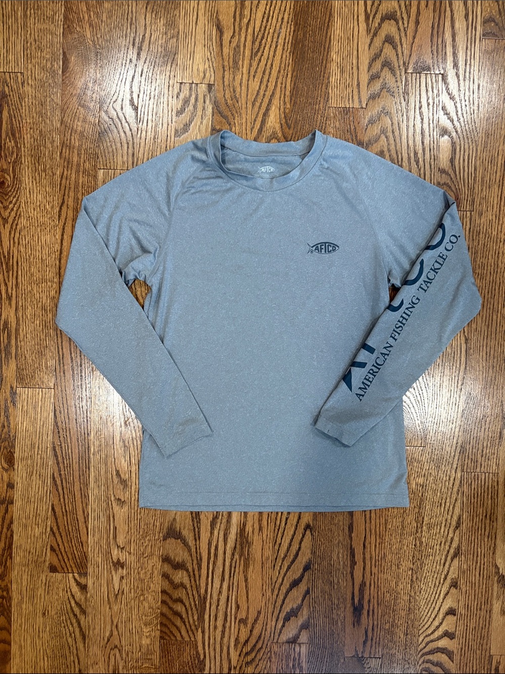 AFTCO boys grey long sleeve performance t-shirt, size M. Great condition